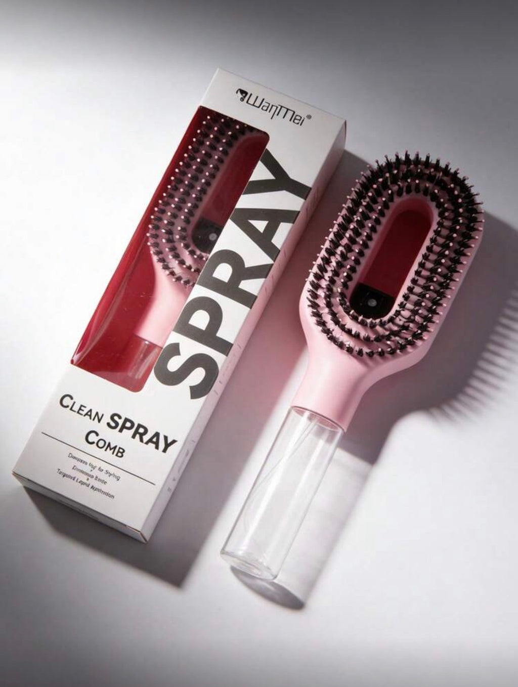 Brosse à cheveux 2-en-1 avec vaporisateur